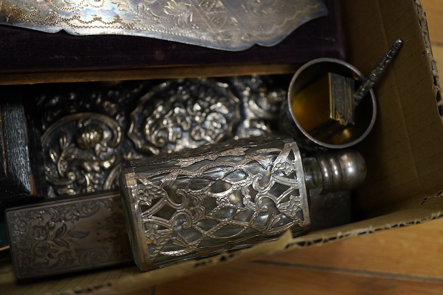 A group of small silver and white metal items including a late Victorian silver cream jug, a late Victorian silver mounted hand mirror, two continental 900 standard mounted small wall mirrors, a modern miniature silver t